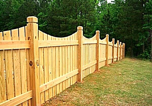 We install a fence from a wooden fence - an inexpensive wooden fence for your garden